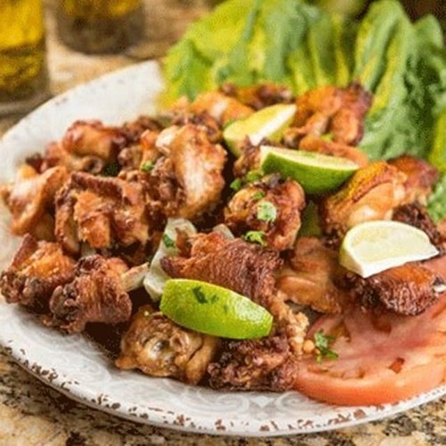 Fried diced chicken “not breaded” . Frango a Passarinho.